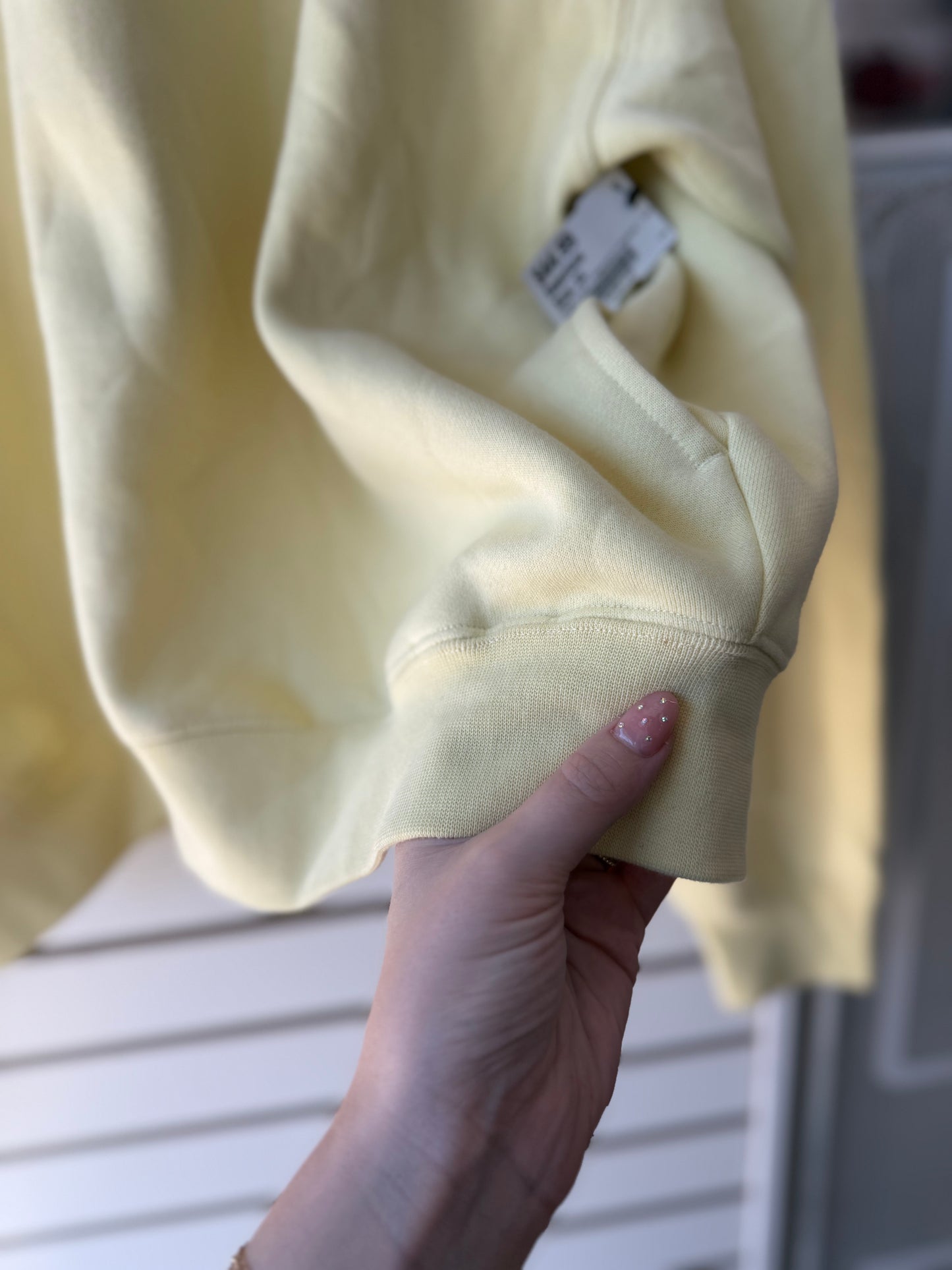Essentials yellow zip up side XL has a few small spots
