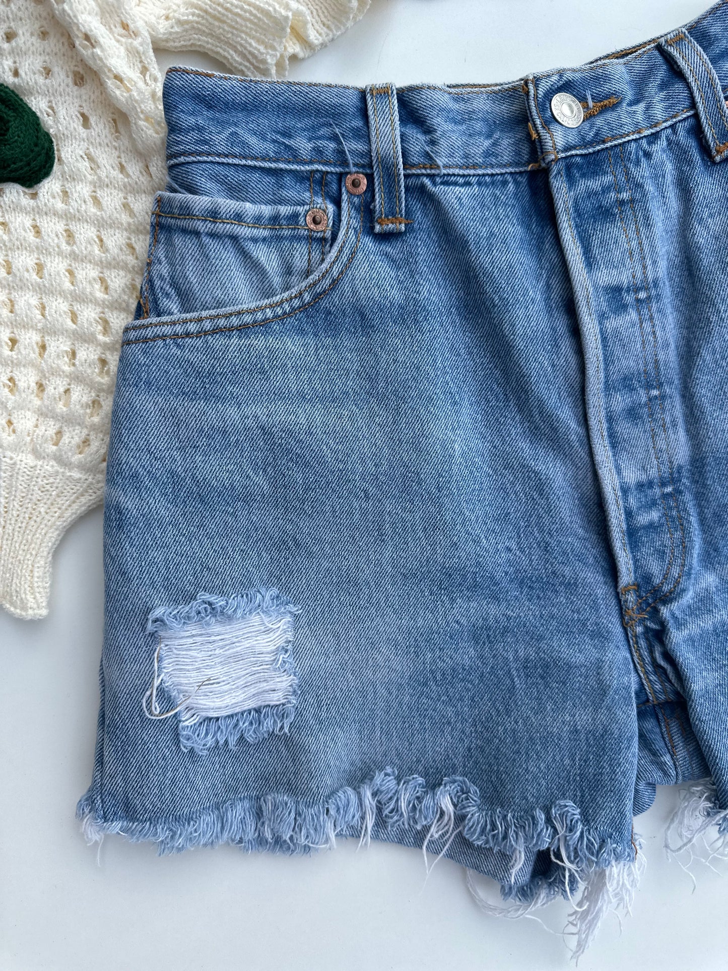 Levi’s 501 distressed cutoff shorts (S)