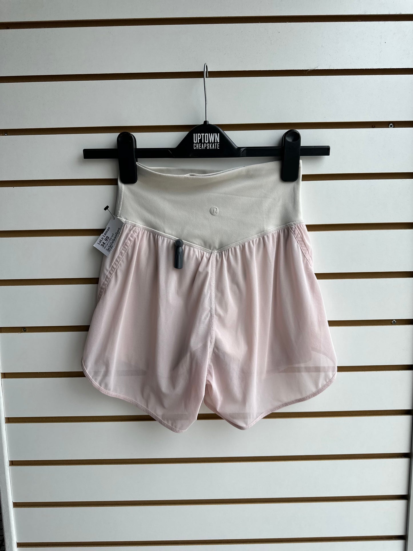 Lululemon pale pink nulu and mesh shorts with cream waistband size 2