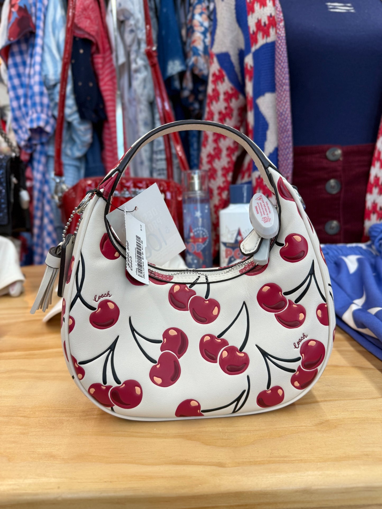 Coach cherry Carmen mini bag with crossbody strap