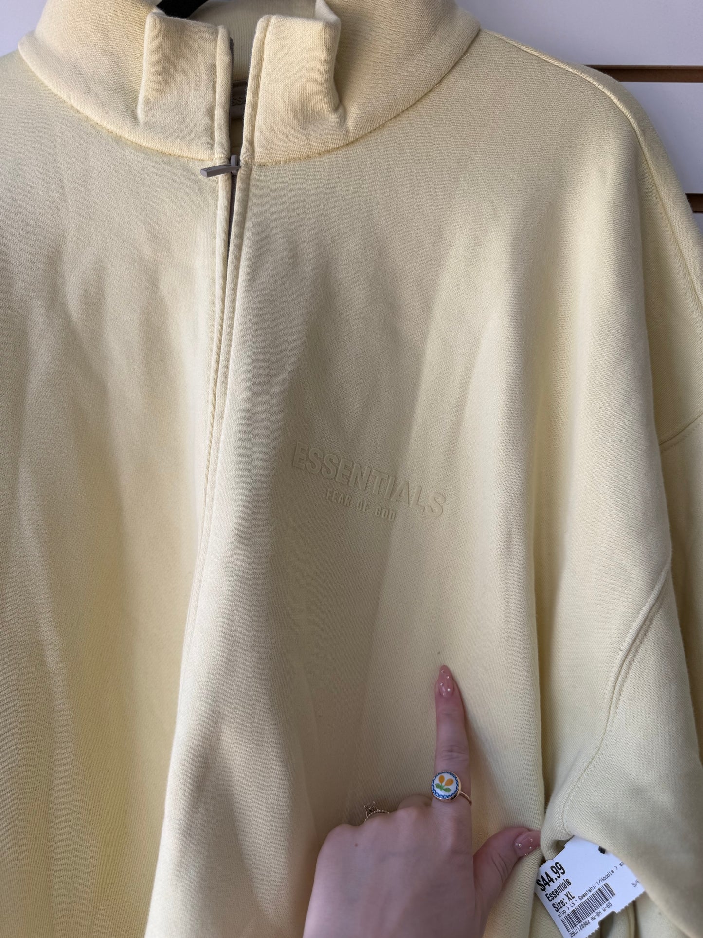 Essentials yellow zip up side XL has a few small spots