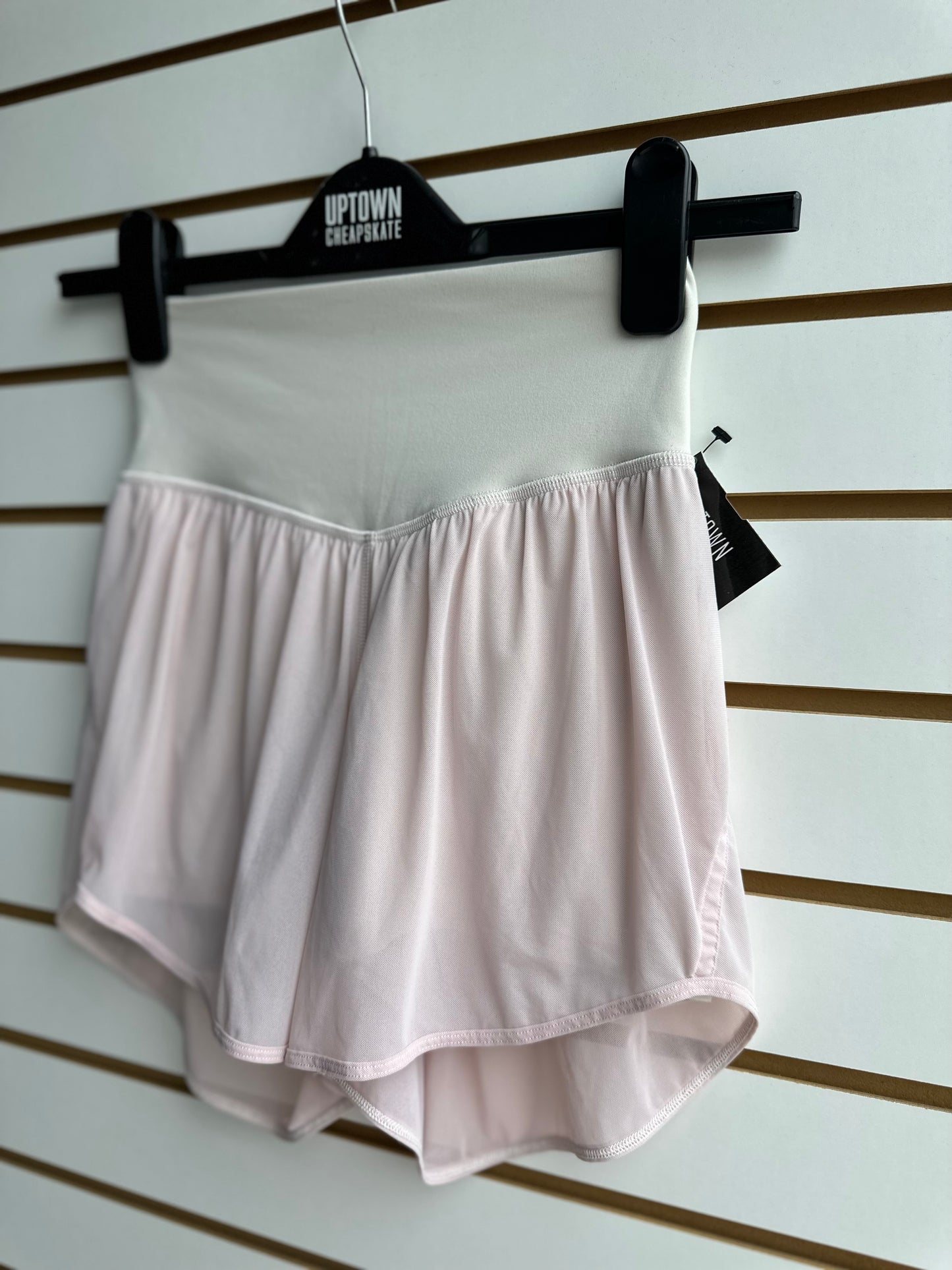 Lululemon pale pink nulu and mesh shorts with cream waistband size 2