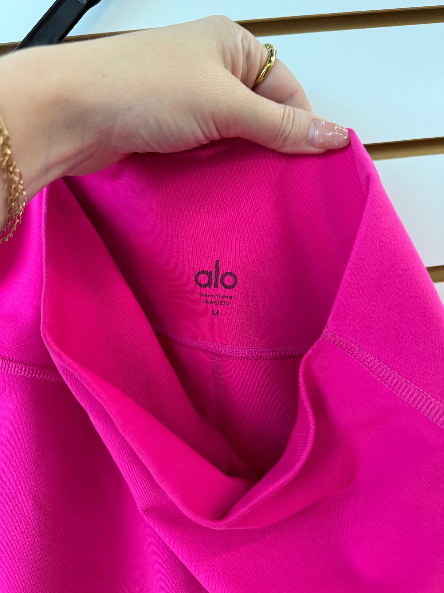 ALO Yoga hot pink biker shorts size medium (tiny mark on back, see photos)