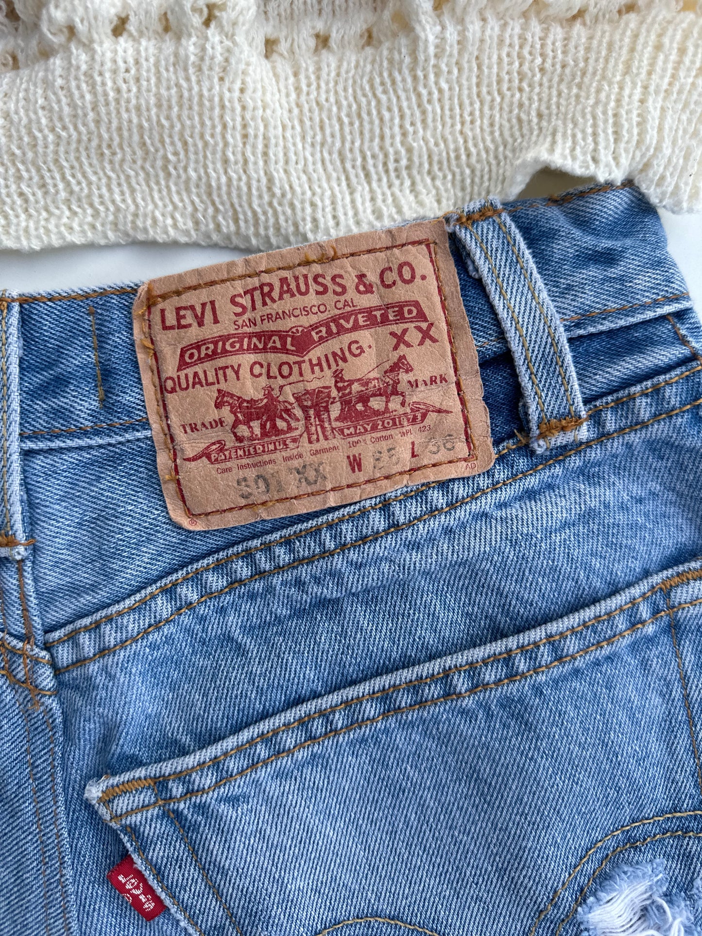 Levi’s 501 distressed cutoff shorts (S)