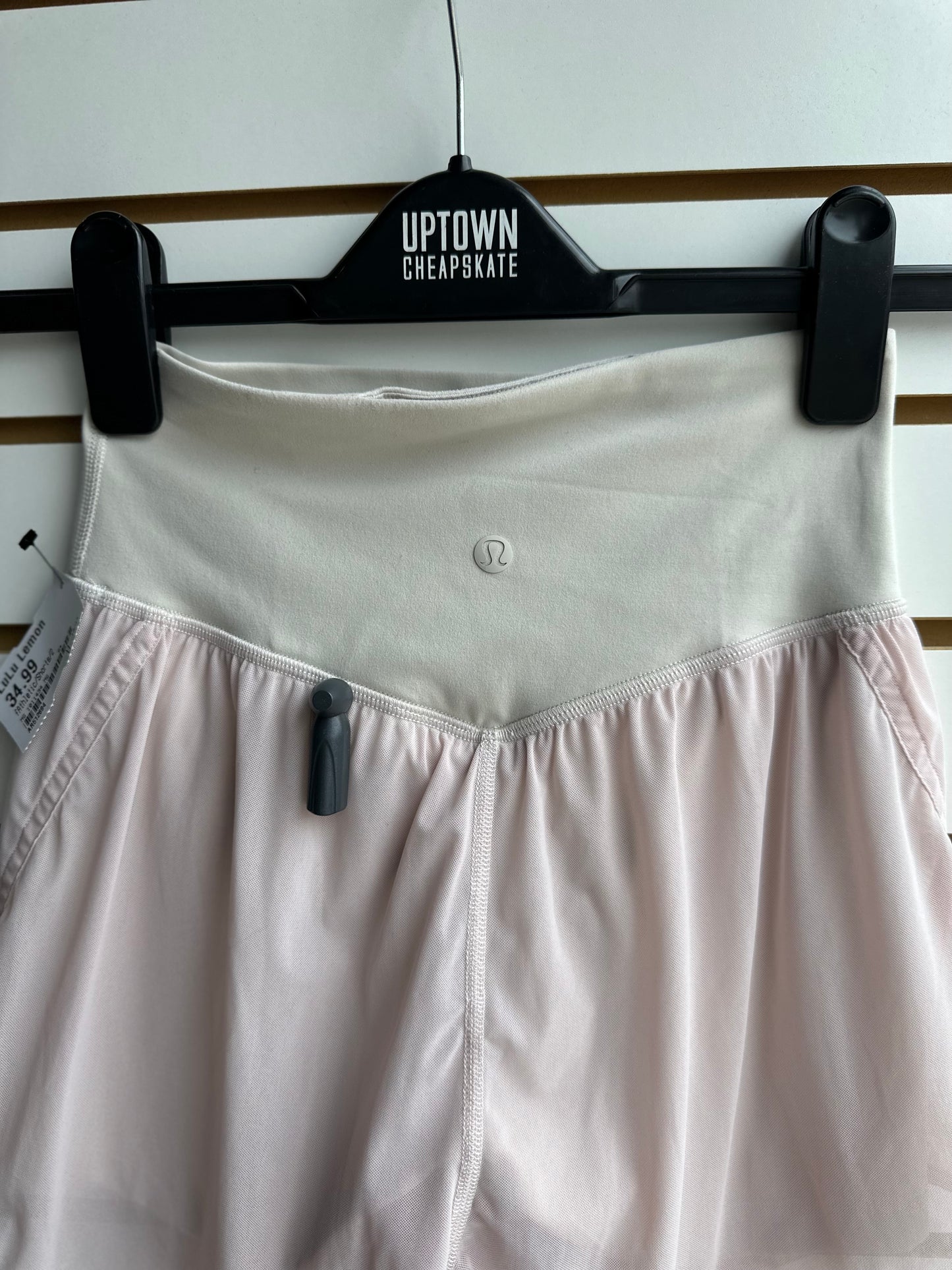 Lululemon pale pink nulu and mesh shorts with cream waistband size 2