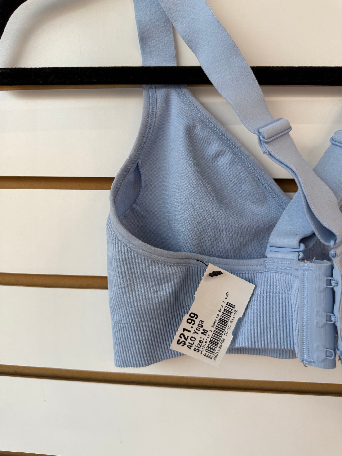 ALO Yoga light blue sports bra clasp closure size medium (small spot on inside)