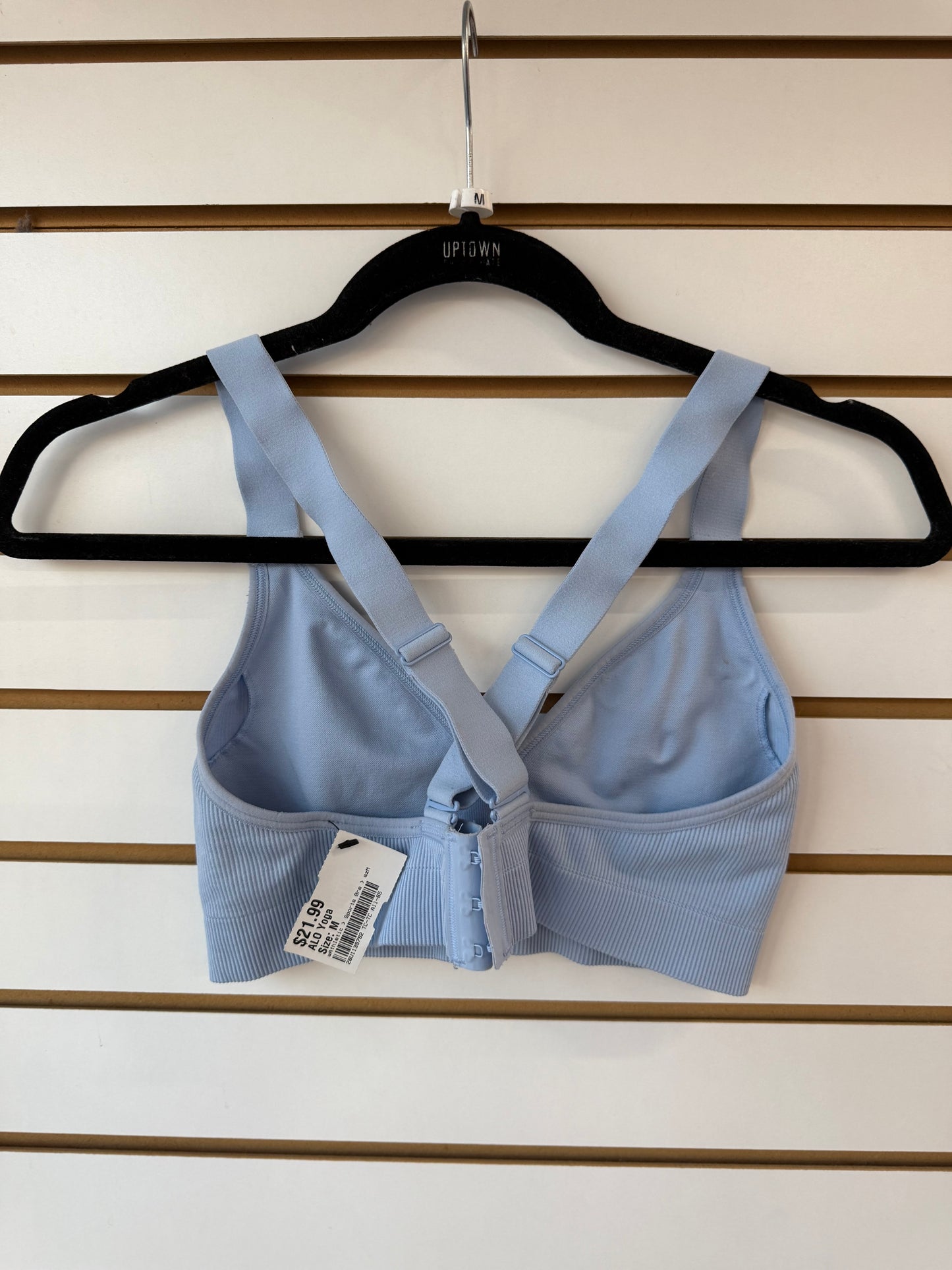 ALO Yoga light blue sports bra clasp closure size medium (small spot on inside)