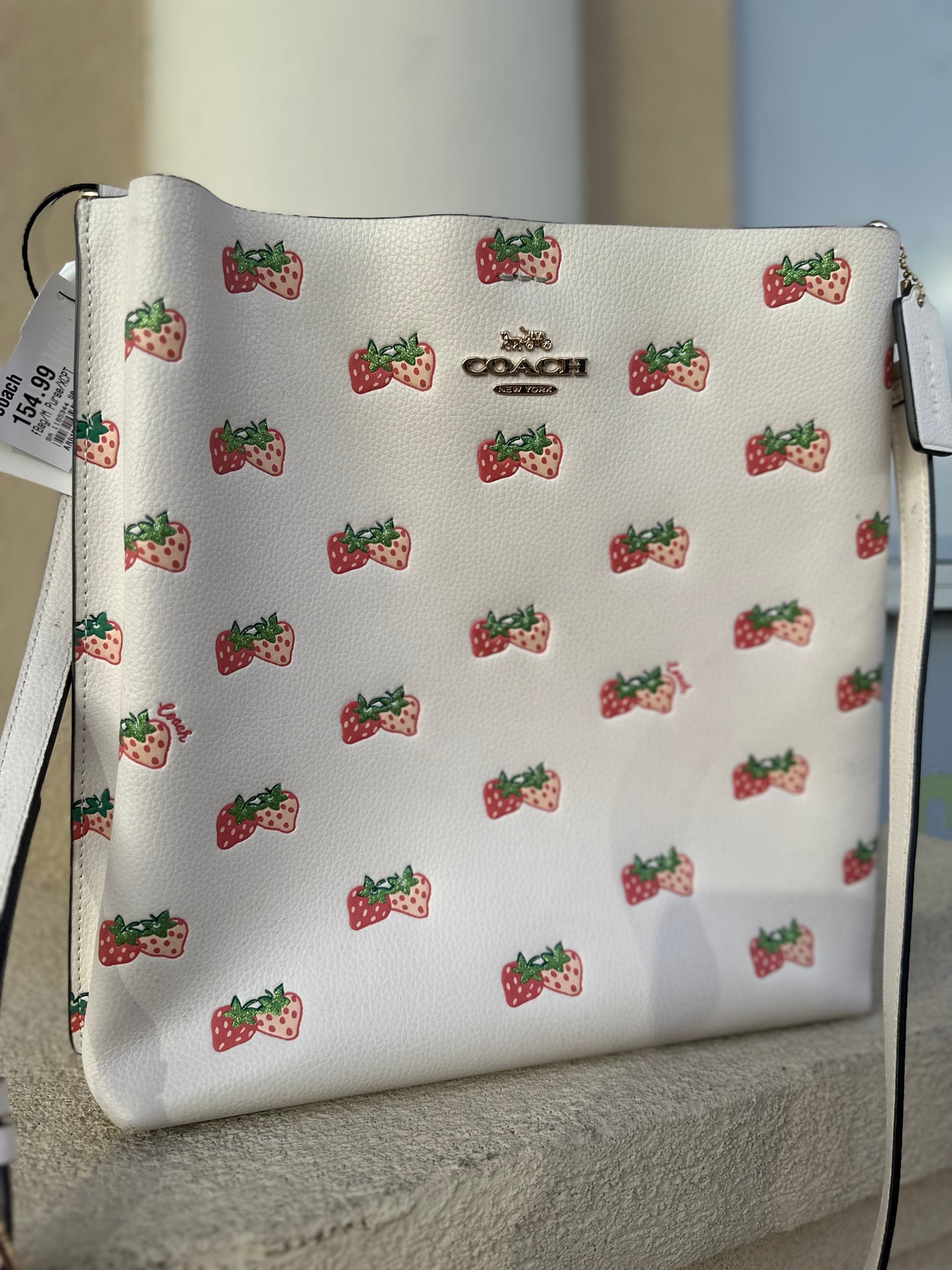 Coach Mollie bucket bag with strawberry print