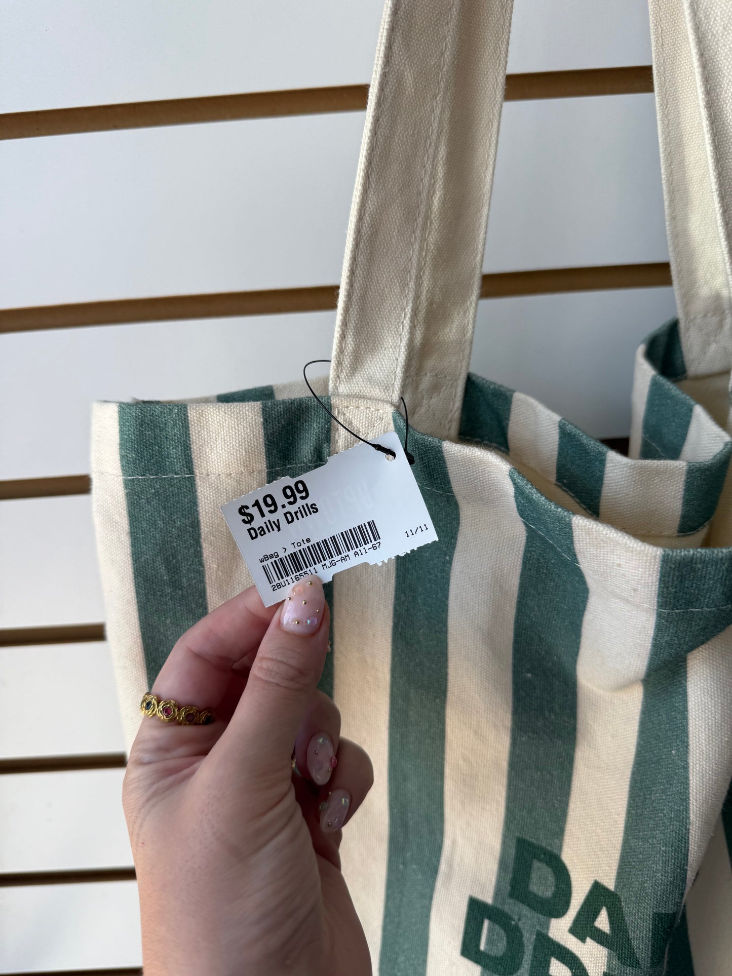 Daily Drills green striped canvas bag (has spotting)