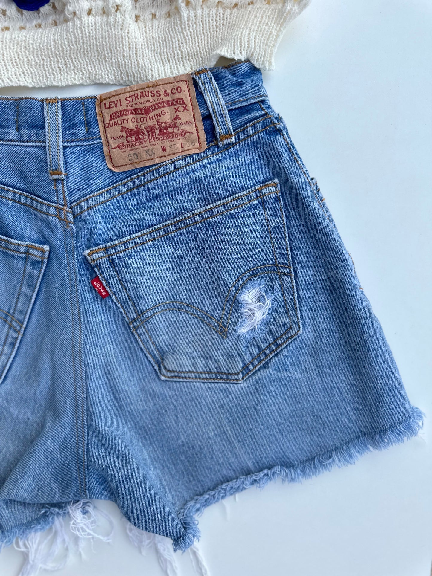 Levi’s 501 distressed cutoff shorts (S)