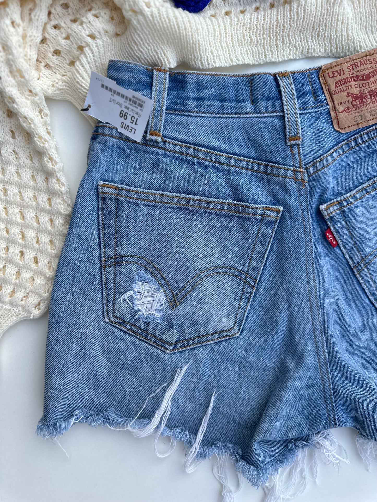 Levi’s 501 distressed cutoff shorts (S)